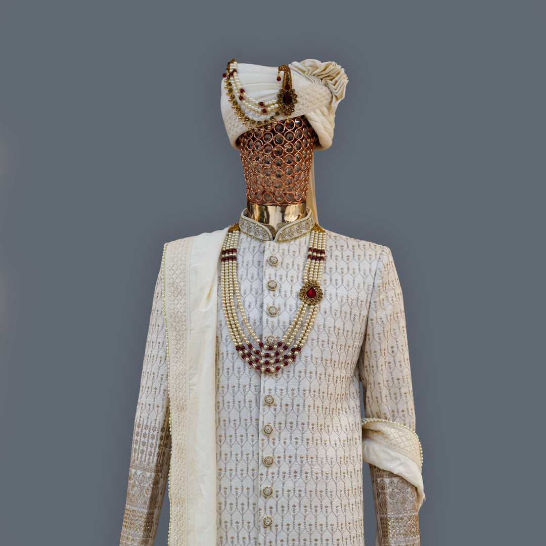 White Raw Silk Sherwani Set with allover Golden Zari Embroidery