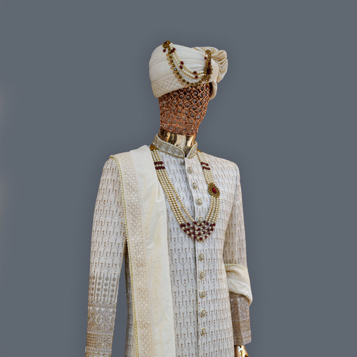 White Raw Silk Sherwani Set with allover Golden Zari Embroidery