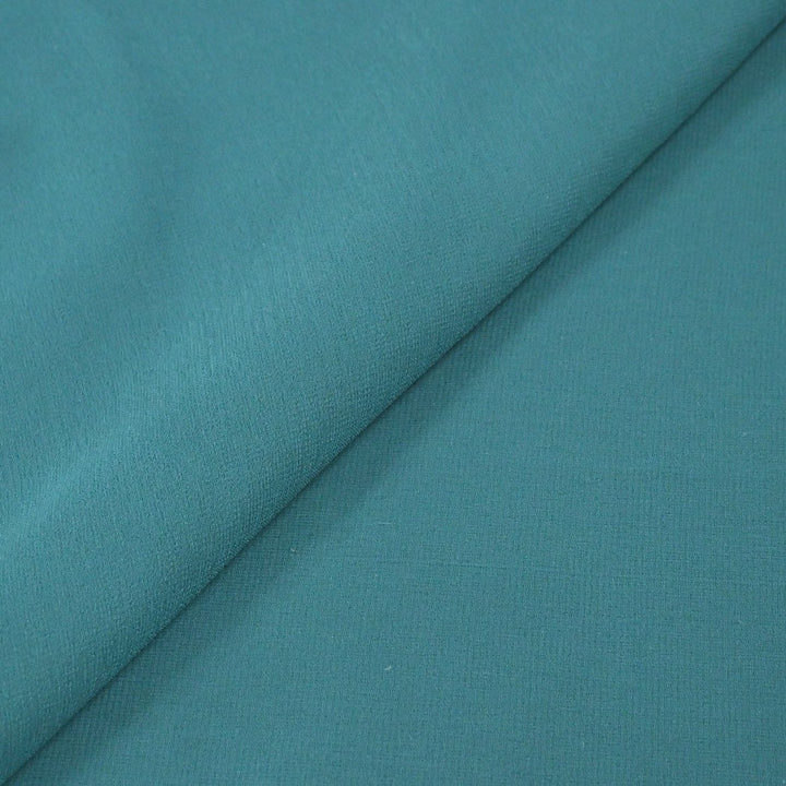 Beetle Green Colour Poly Georgette Fabrics