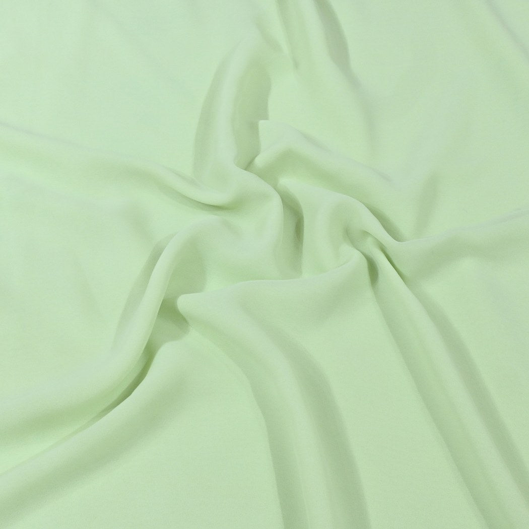 Pixie Green Colour Poly Georgette Fabrics