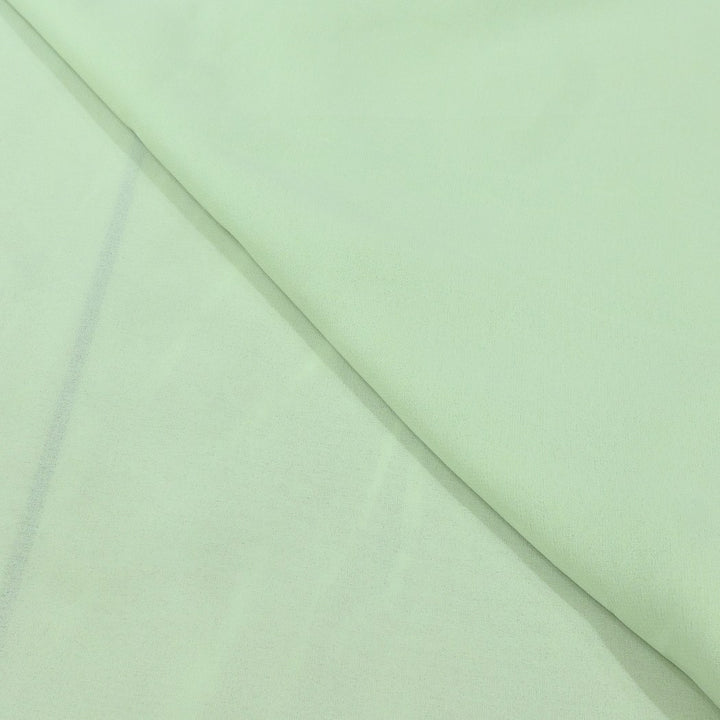 Pixie Green Colour Poly Georgette Fabrics