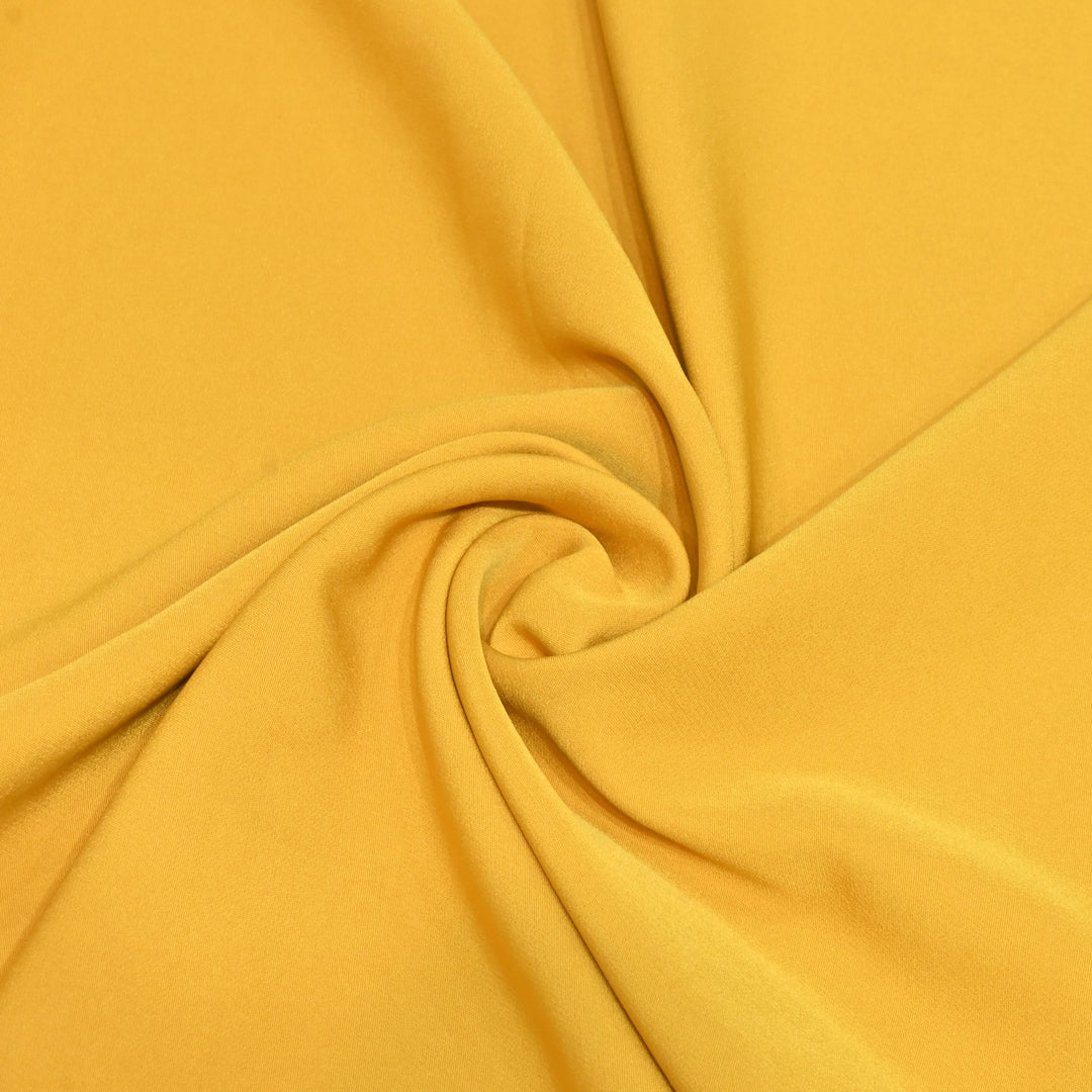 Yellow Colour Banana Crepe Fabrics