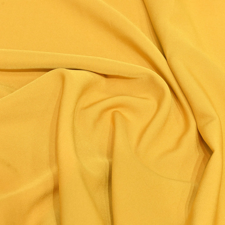 Yellow Colour Banana Crepe Fabrics