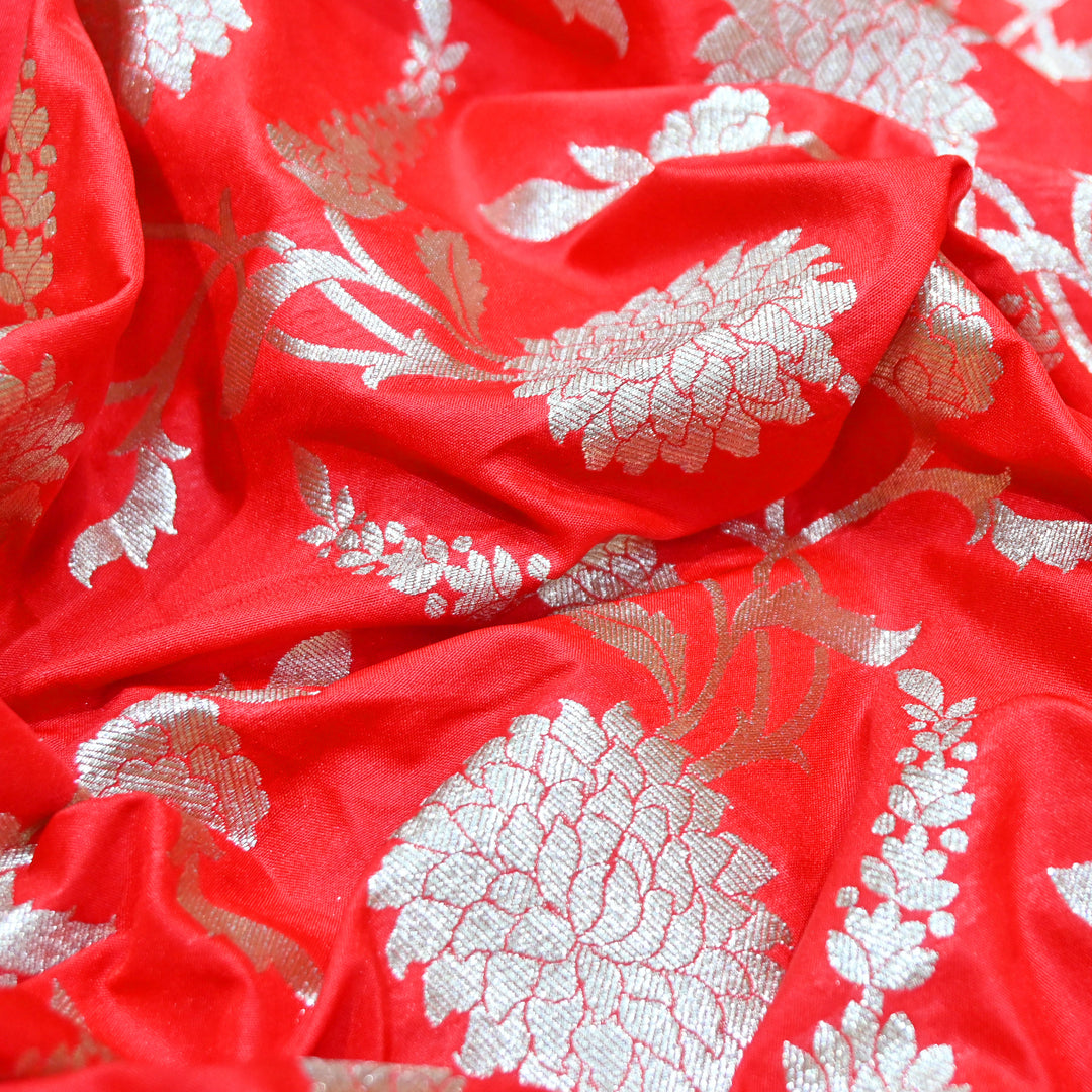 Vibrant red base with shimmering gold floral brocade.