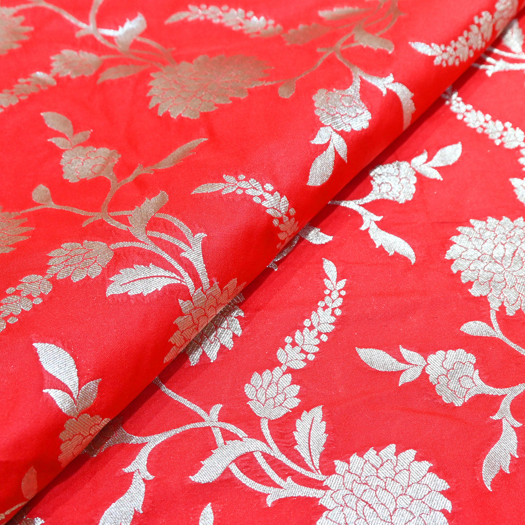 Vibrant red base with shimmering gold floral brocade.