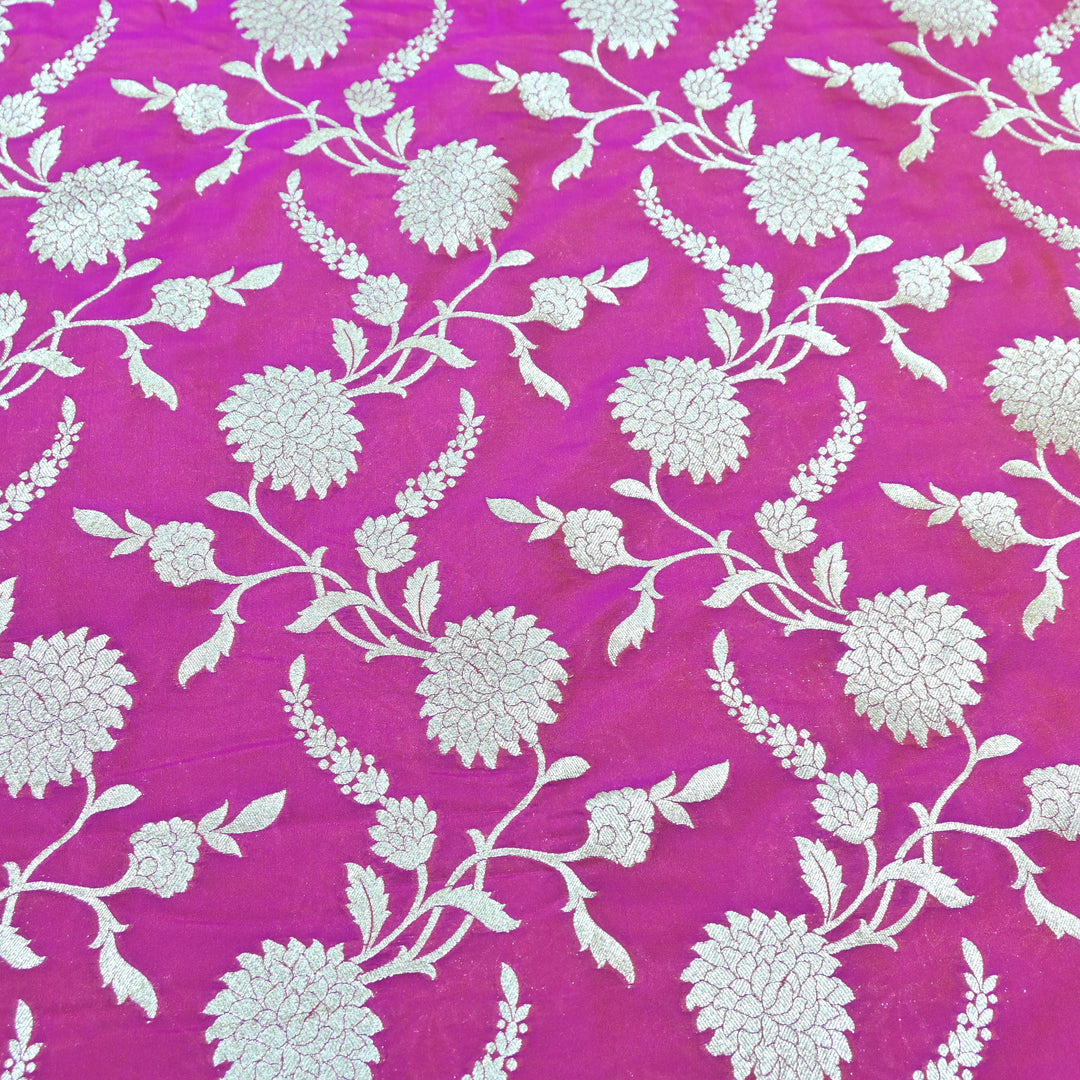 Vibrant pink base with shimmering gold floral brocade.