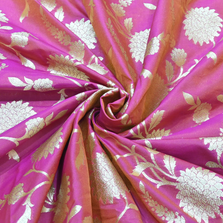 Vibrant pink base with shimmering gold floral brocade.