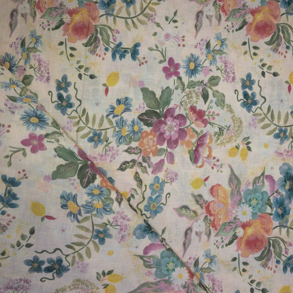 Floral patterned fabric with colorful flowers and leaves on a light background