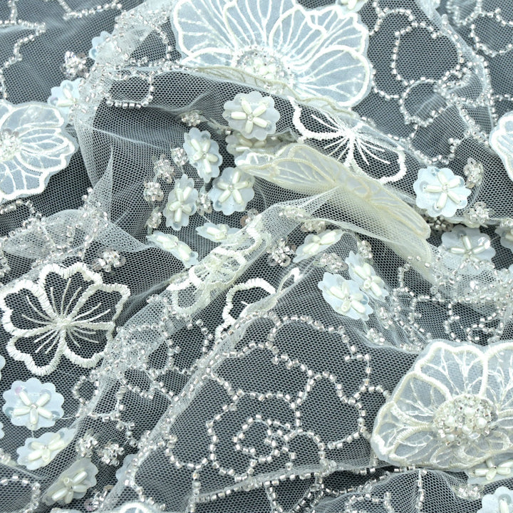 Cut dana and sequin heavy embroidered fabric with 3D flower on imported net