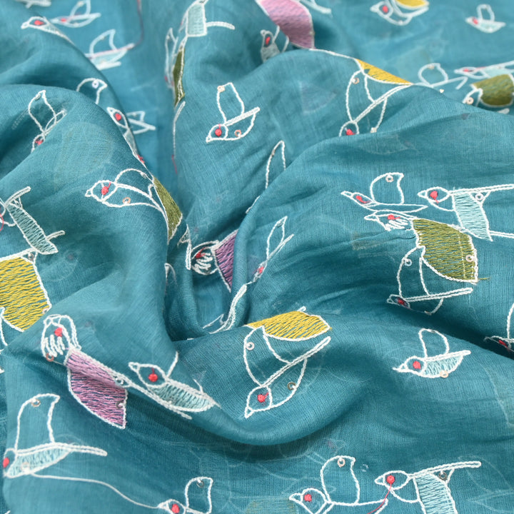Elegant turquoise blue base Mul Chanderi Sequins Embroidery.