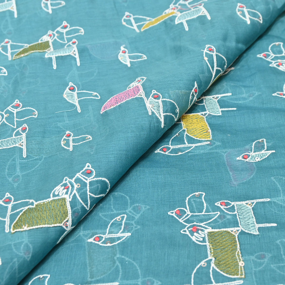 Elegant turquoise blue base Mul Chanderi Sequins Embroidery.