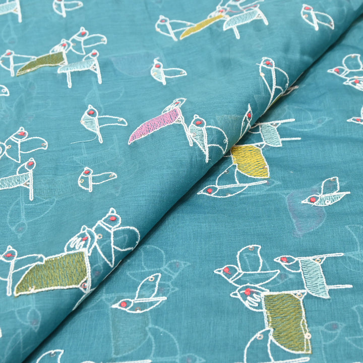 Elegant turquoise blue base Mul Chanderi Sequins Embroidery.