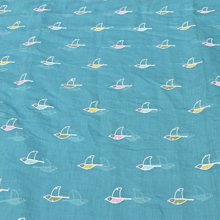 Elegant turquoise blue base Mul Chanderi Sequins Embroidery.