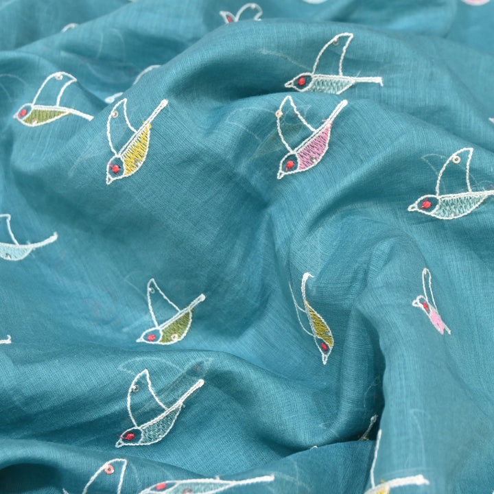 Elegant turquoise blue base Mul Chanderi Sequins Embroidery.