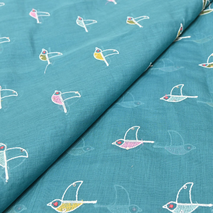 Elegant turquoise blue base Mul Chanderi Sequins Embroidery.