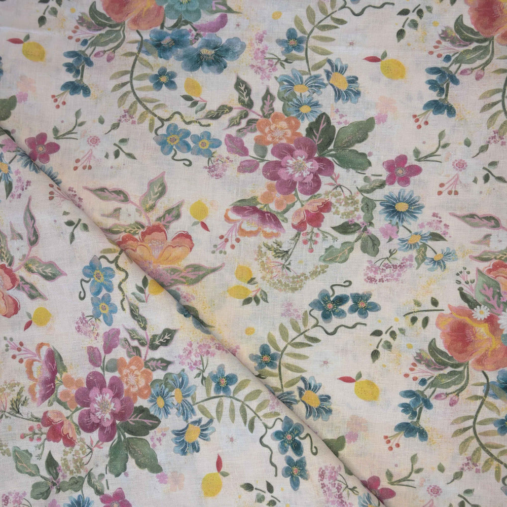 Floral patterned linen fabric with colorful flowers on a white base