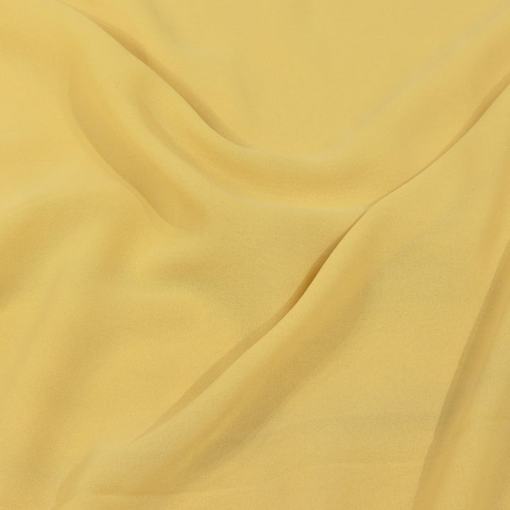 Saffron Yellow Colour Poly Georgette Fabrics