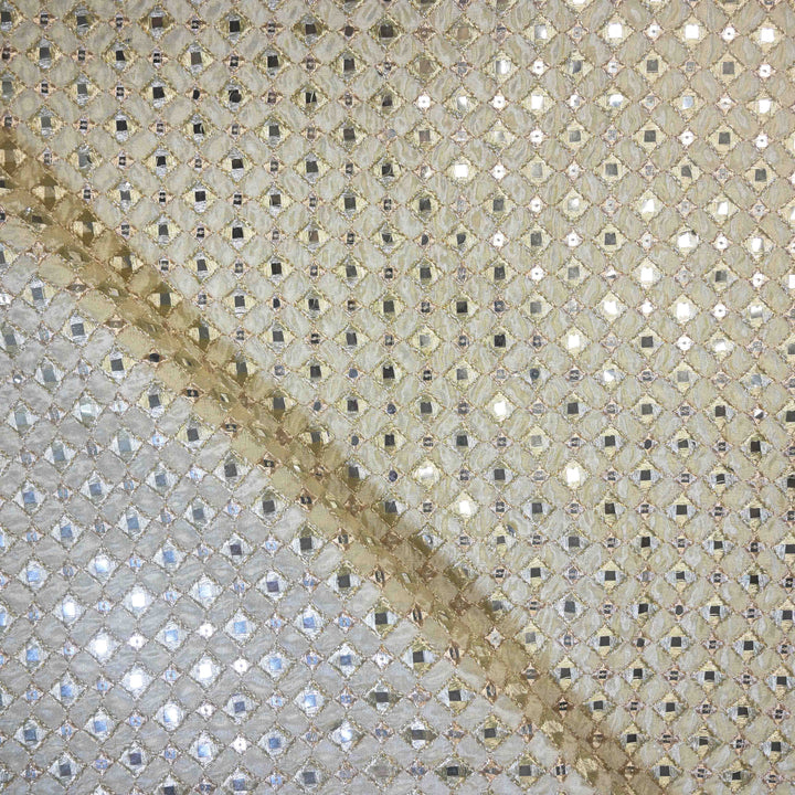 Mosaic pattern with a diagonal brown stain on a textured surface