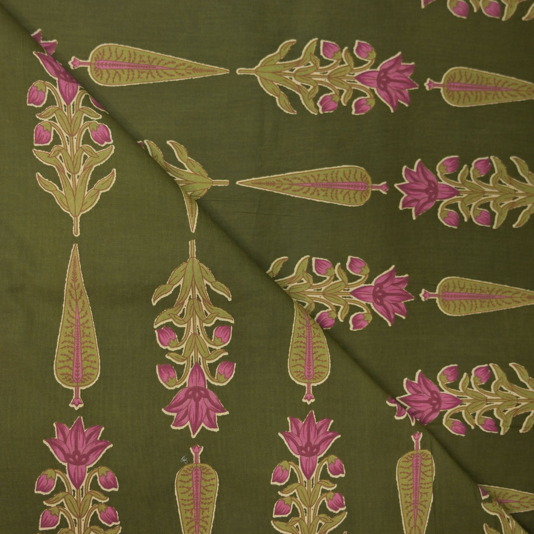 Green fabric with pink and gold floral embroidery pattern