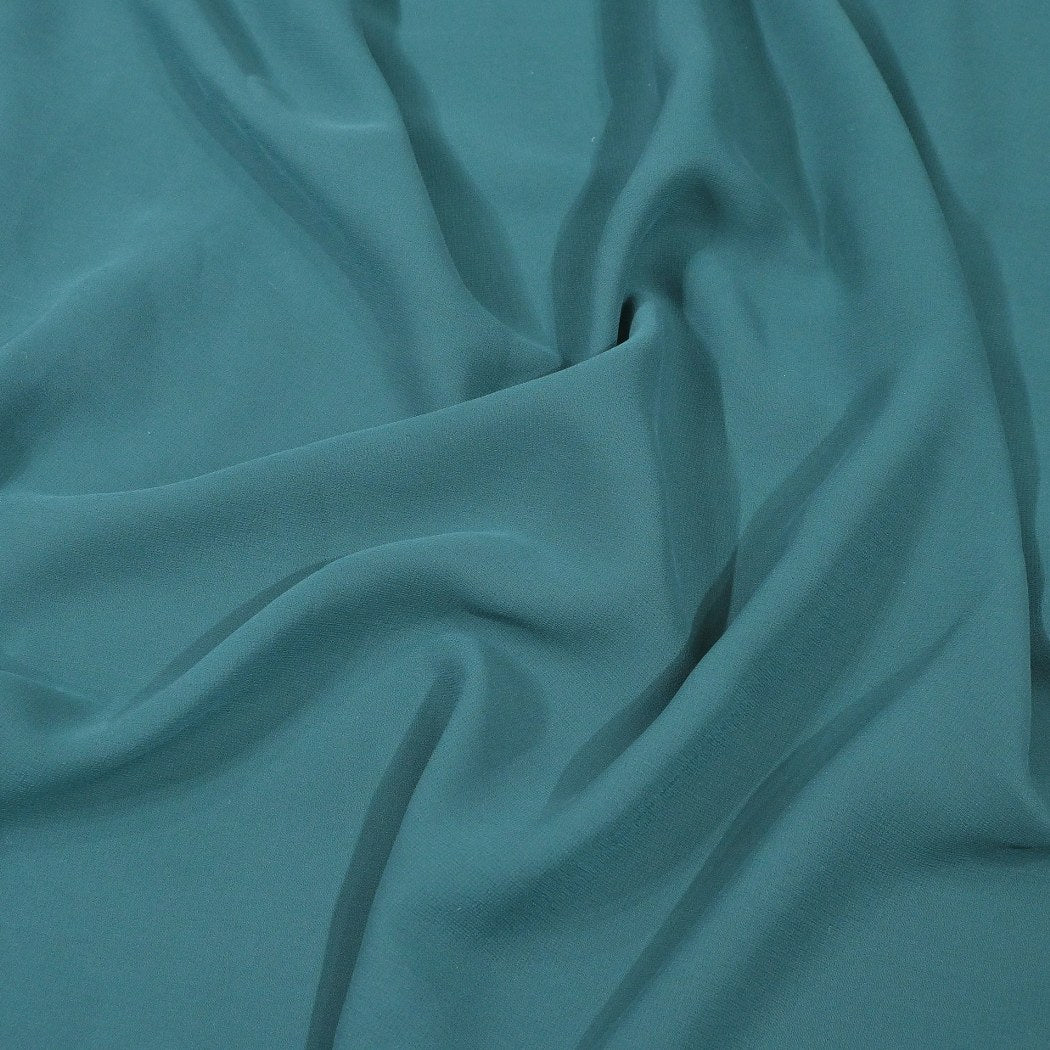 Beetle Green Colour Poly Georgette Fabrics